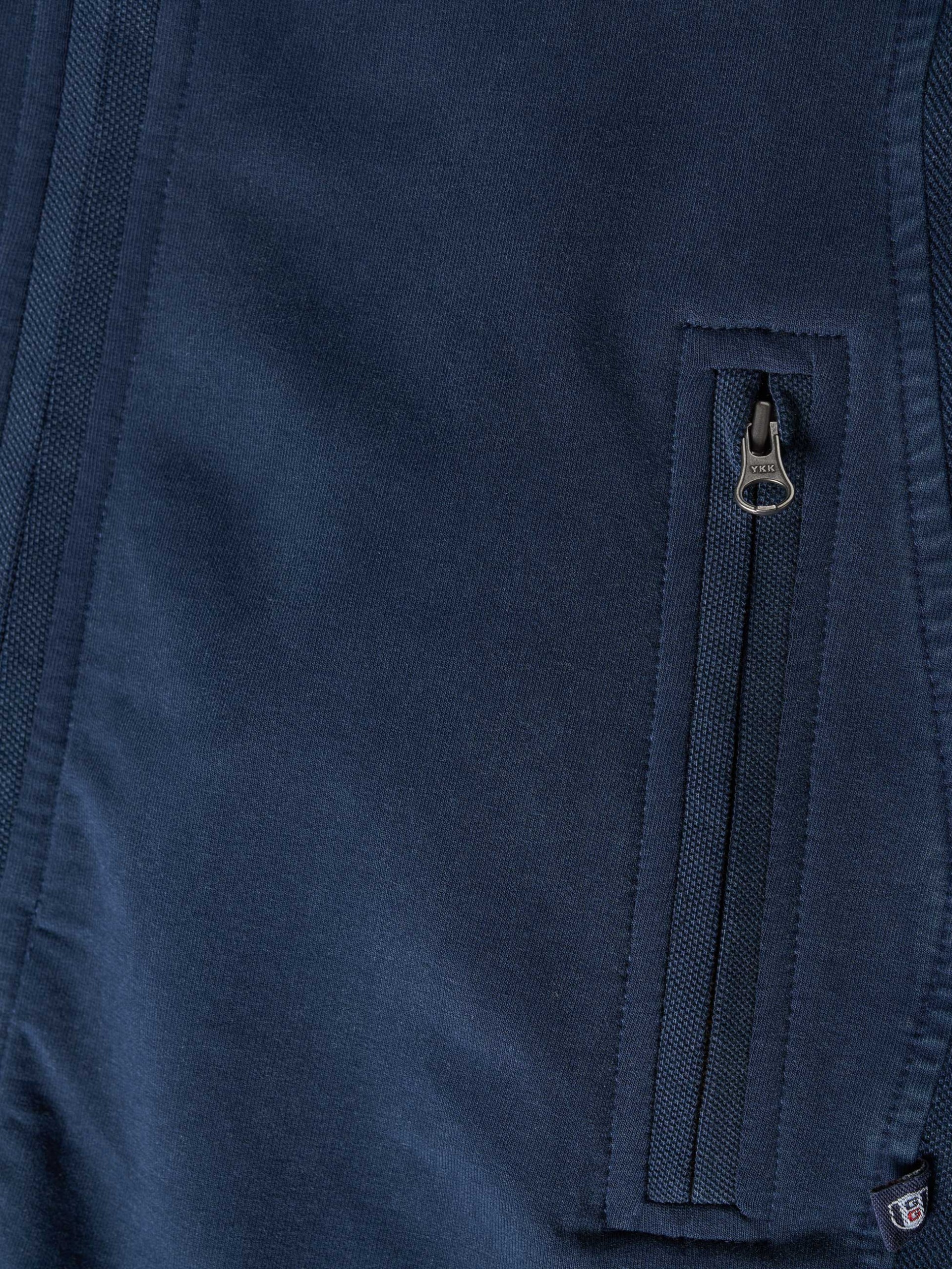 Abrigo interlock con cuello alto