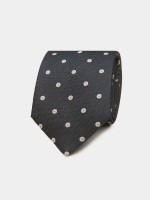 Corbata de seda texturizada con lunares 