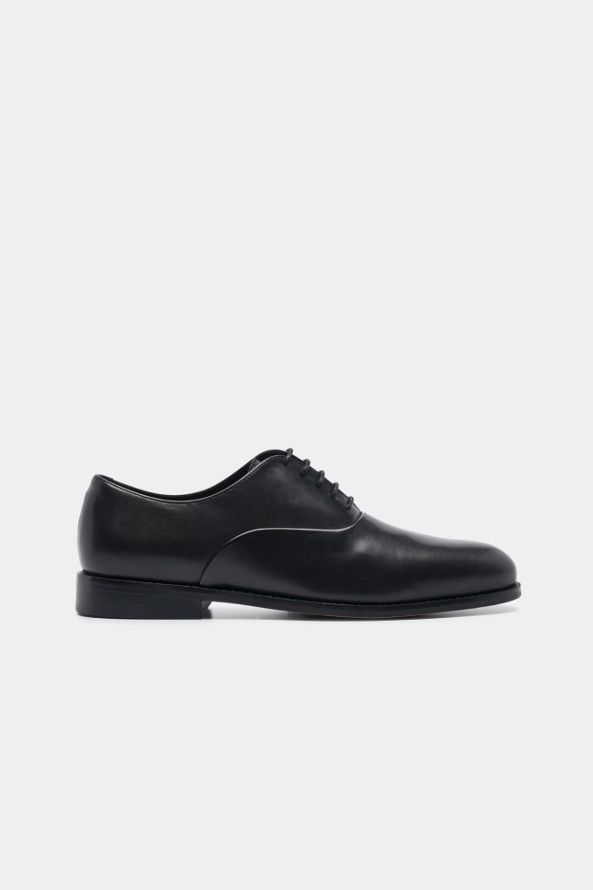 Sapatos clssicos em pele