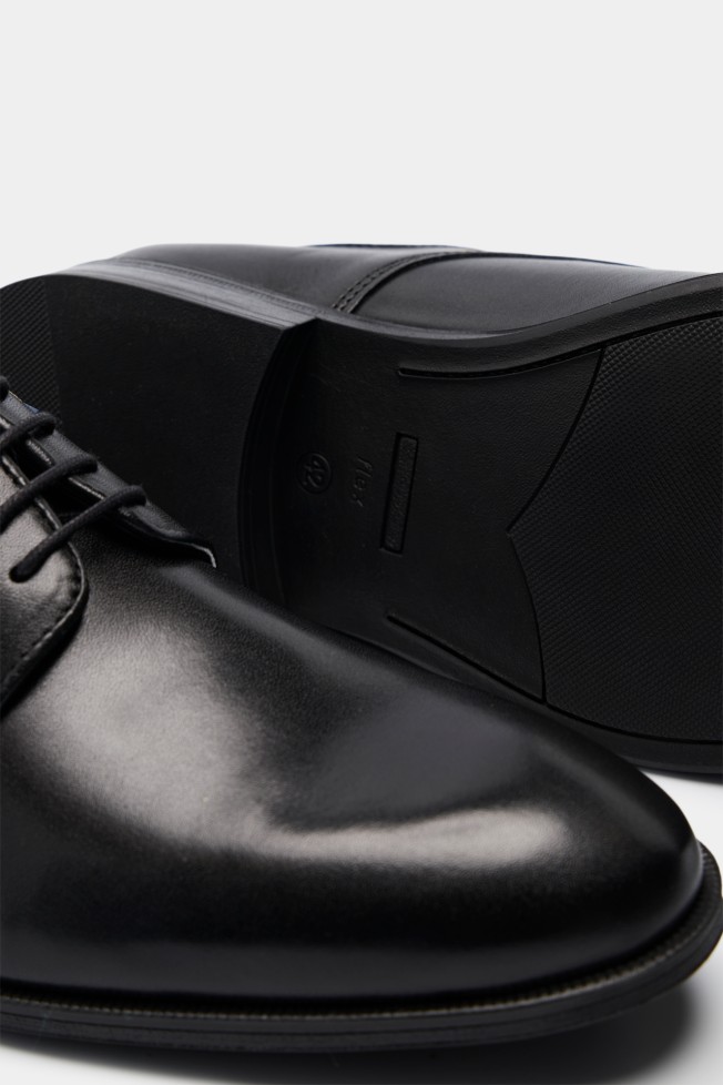 Zapatos clásicos de piel Zapatos clásicos de piel