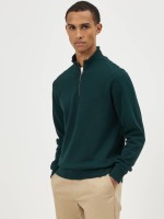 Jersey de cuello alto verde con cremallera