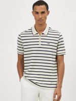 Polo �s riscas em malha piqu�