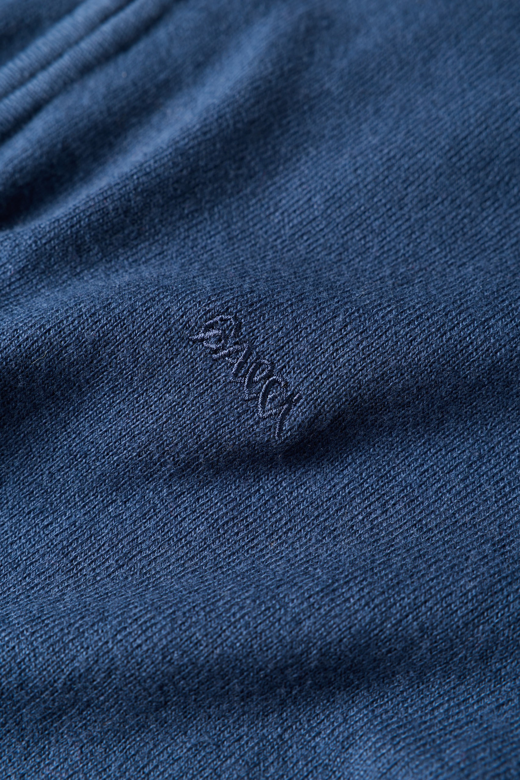 Jersey de cuello alto azul marino con cierre de cremallera