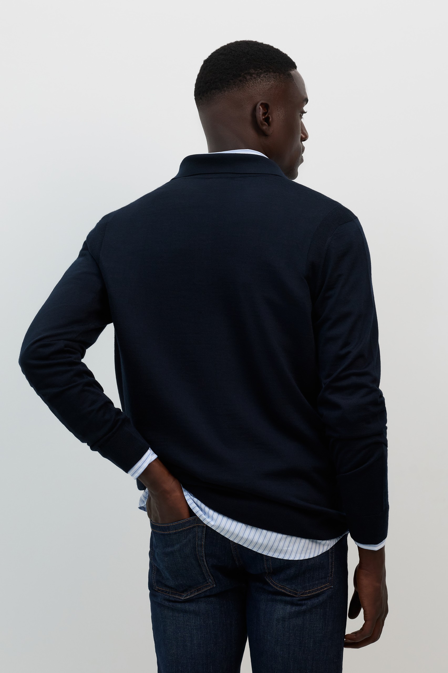 Polo de punto de lana merino azul marino