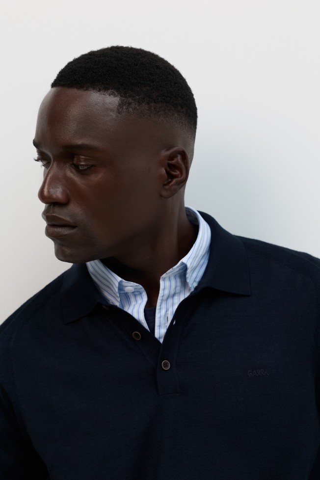 Polo de malha com lã merino em azul-marinho Polo de malha com lã merino em azul-marinho